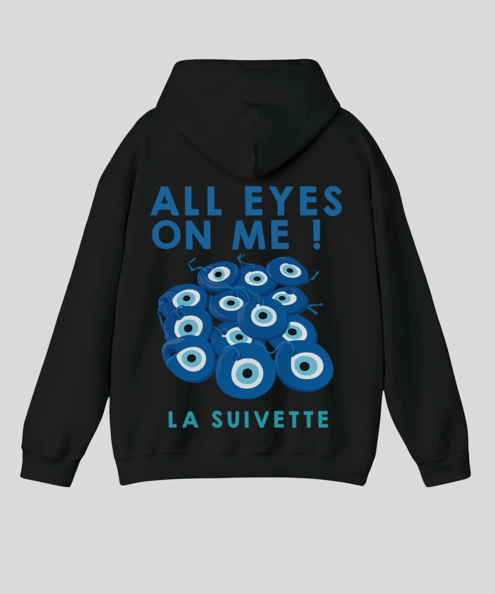 Hoodie noir oversize avec grand motif dorsal bleu "All Eyes On Me" d'yeux protecteurs pour éloigner les ondes négatives et La Suivette.