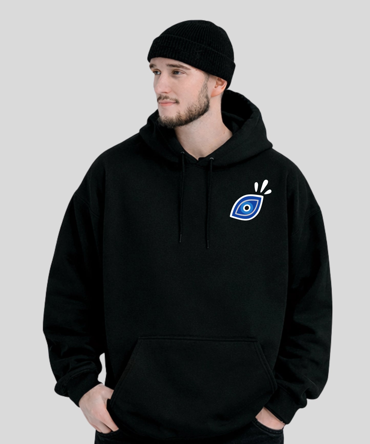 Hoodie noir oversize avec grand motif dorsal bleu "All Eyes On Me" d'yeux protecteurs pour éloigner les ondes négatives et La Suivette.